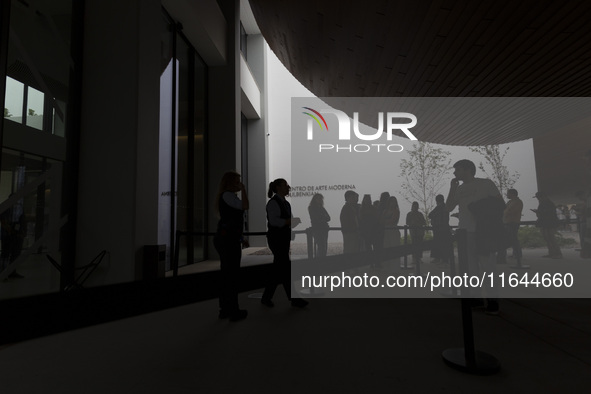 In Lisbon, Portugal, on October 6, 2024, people wait to enter the new Center for Modern Art. CAM is an art and culture center with a collect...