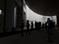 In Lisbon, Portugal, on October 6, 2024, people wait to enter the new Center for Modern Art. CAM is an art and culture center with a collect...