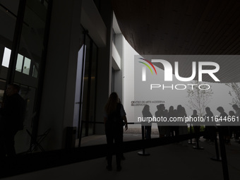 In Lisbon, Portugal, on October 6, 2024, people wait to enter the new Center for Modern Art. CAM is an art and culture center with a collect...