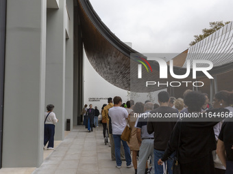 In Lisbon, Portugal, on October 6, 2024, people wait to enter the new Center for Modern Art. CAM is an art and culture center with a collect...