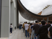 In Lisbon, Portugal, on October 6, 2024, people wait to enter the new Center for Modern Art. CAM is an art and culture center with a collect...