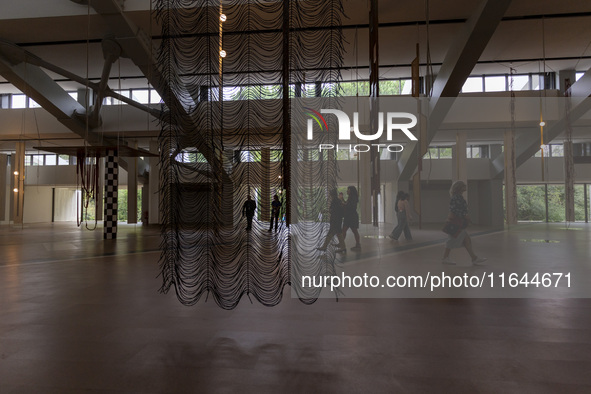 People are seen inside the new Center for Modern Art in Lisbon, Portugal, on October 6, 2024. CAM is an art and culture center with a collec...