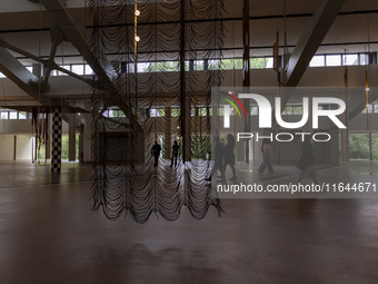 People are seen inside the new Center for Modern Art in Lisbon, Portugal, on October 6, 2024. CAM is an art and culture center with a collec...