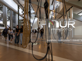 People are seen inside the new Center for Modern Art in Lisbon, Portugal, on October 6, 2024. CAM is an art and culture center with a collec...