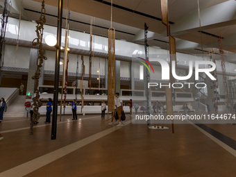 People are seen inside the new Center for Modern Art in Lisbon, Portugal, on October 6, 2024. CAM is an art and culture center with a collec...