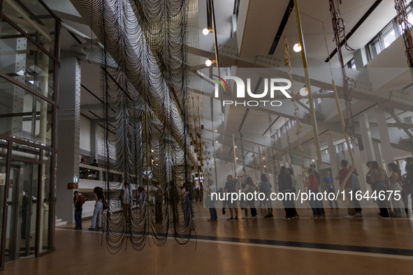 People are seen inside the new Center for Modern Art in Lisbon, Portugal, on October 6, 2024. CAM is an art and culture center with a collec...