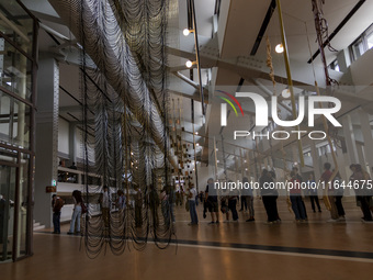 People are seen inside the new Center for Modern Art in Lisbon, Portugal, on October 6, 2024. CAM is an art and culture center with a collec...