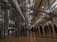 People are seen inside the new Center for Modern Art in Lisbon, Portugal, on October 6, 2024. CAM is an art and culture center with a collec...