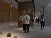 People look at art inside the new Center for Modern Art in Lisbon, Portugal, on October 6, 2024. CAM is an art and culture center with a col...