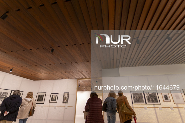 People look at art inside the new Center for Modern Art in Lisbon, Portugal, on October 6, 2024. CAM is an art and culture center with a col...