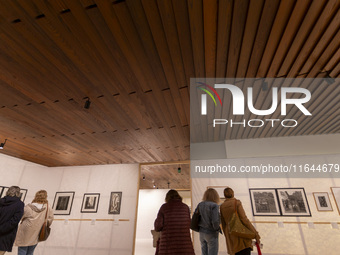 People look at art inside the new Center for Modern Art in Lisbon, Portugal, on October 6, 2024. CAM is an art and culture center with a col...