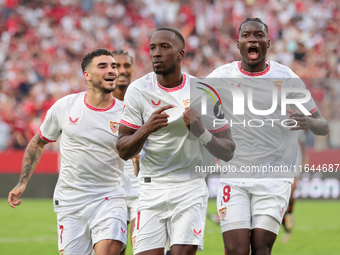 Dodi Lukebakio of Sevilla FC celebrates a goal during the La Liga EA Sports match between Sevilla FC and Real Betis at Sanchez Pizjuan in Se...