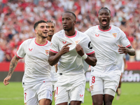 Dodi Lukebakio of Sevilla FC celebrates a goal during the La Liga EA Sports match between Sevilla FC and Real Betis at Sanchez Pizjuan in Se...