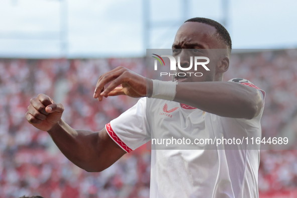 Dodi Lukebakio of Sevilla FC celebrates a goal during the La Liga EA Sports match between Sevilla FC and Real Betis at Sanchez Pizjuan in Se...