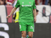 Diego Llorente of Real Betis runs with the ball during the La Liga EA Sports match between Sevilla FC and Real Betis at Sanchez Pizjuan in S...