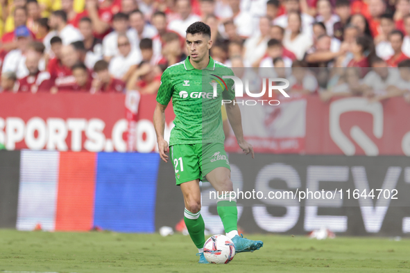 Marc Roca of Real Betis passes the ball during the La Liga EA Sports match between Sevilla FC and Real Betis at Sanchez Pizjuan in Seville,...