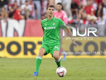 Diego Llorente of Real Betis passes the ball during the La Liga EA Sports match between Sevilla FC and Real Betis at Sanchez Pizjuan in Sevi...