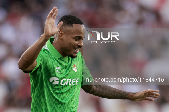 Natan Bernardo de Souza of Real Betis argues with the referee during the La Liga EA Sports match between Sevilla FC and Real Betis at Sanche...