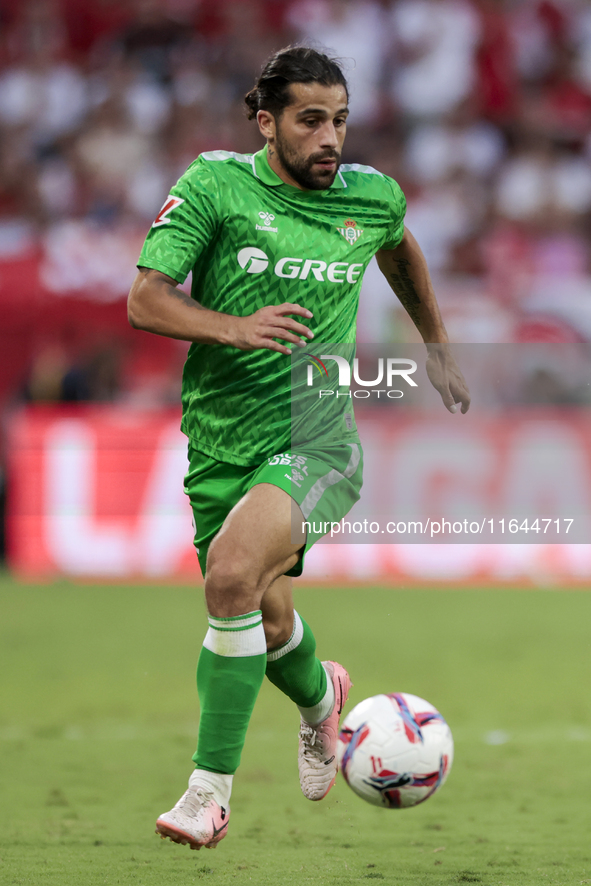 Ricardo Rodriguez of Real Betis runs with the ball during the La Liga EA Sports match between Sevilla FC and Real Betis at Sanchez Pizjuan i...