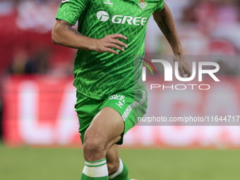 Ricardo Rodriguez of Real Betis runs with the ball during the La Liga EA Sports match between Sevilla FC and Real Betis at Sanchez Pizjuan i...