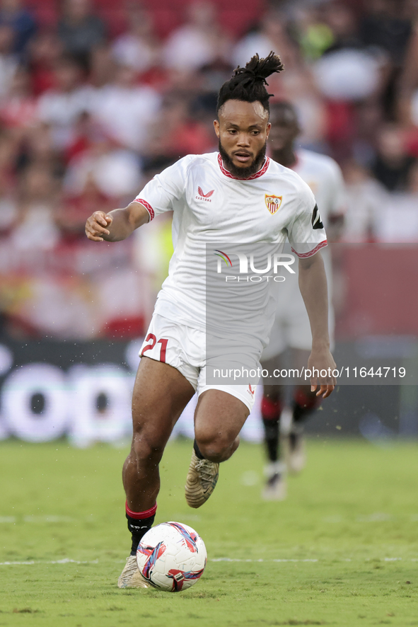 Chidera Ejuke of Sevilla FC runs with the ball during the La Liga EA Sports match between Sevilla FC and Real Betis at Sanchez Pizjuan in Se...