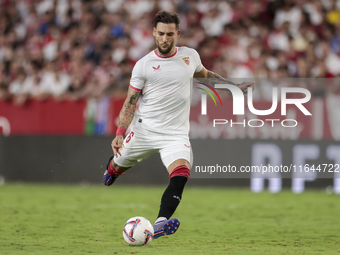 Nemanja Gudelj of Sevilla FC hits the ball during the La Liga EA Sports match between Sevilla FC and Real Betis at Sanchez Pizjuan in Sevill...