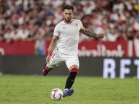 Nemanja Gudelj of Sevilla FC hits the ball during the La Liga EA Sports match between Sevilla FC and Real Betis at Sanchez Pizjuan in Sevill...