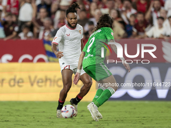 Chidera Ejuke of Sevilla FC runs with the ball during the La Liga EA Sports match between Sevilla FC and Real Betis at Sanchez Pizjuan in Se...