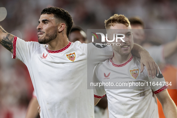 Isaac Romero of Sevilla FC and Peque Fernandez of Sevilla FC celebrate winning during the La Liga EA Sports match between Sevilla FC and Rea...