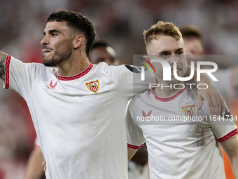 Isaac Romero of Sevilla FC and Peque Fernandez of Sevilla FC celebrate winning during the La Liga EA Sports match between Sevilla FC and Rea...