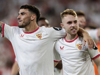 Isaac Romero of Sevilla FC and Peque Fernandez of Sevilla FC celebrate winning during the La Liga EA Sports match between Sevilla FC and Rea...