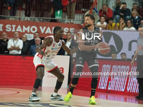 Kyle Weems of Bertram Derthona Tortona and Gabe Brown of Openjobmetis Varese play during the LBA Italy Championship match between Openjobmet...