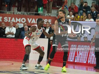 Kyle Weems of Bertram Derthona Tortona and Gabe Brown of Openjobmetis Varese play during the LBA Italy Championship match between Openjobmet...