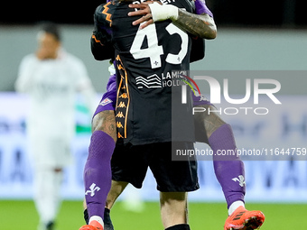 Dodo of ACF Fiorentina celebrates with David De Gea after Albert Gudmundsson scored second goal during the Serie A Enilive match between ACF...