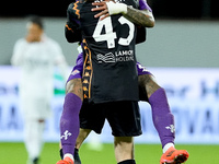 Dodo of ACF Fiorentina celebrates with David De Gea after Albert Gudmundsson scored second goal during the Serie A Enilive match between ACF...