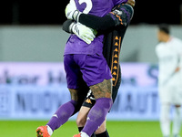 Dodo of ACF Fiorentina celebrates with David De Gea after Albert Gudmundsson scored second goal during the Serie A Enilive match between ACF...