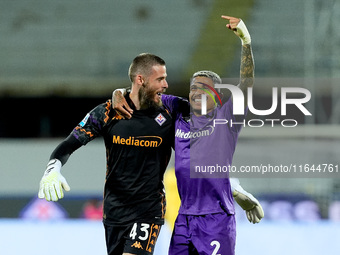 Dodo of ACF Fiorentina celebrates with David De Gea after Albert Gudmundsson scored second goal during the Serie A Enilive match between ACF...