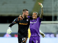 Dodo of ACF Fiorentina celebrates with David De Gea after Albert Gudmundsson scored second goal during the Serie A Enilive match between ACF...