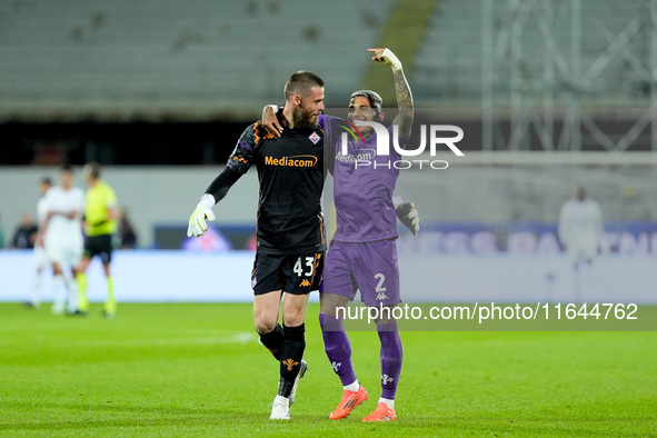 Dodo of ACF Fiorentina celebrates with David De Gea after Albert Gudmundsson scored second goal during the Serie A Enilive match between ACF...