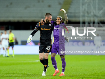 Dodo of ACF Fiorentina celebrates with David De Gea after Albert Gudmundsson scored second goal during the Serie A Enilive match between ACF...