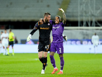 Dodo of ACF Fiorentina celebrates with David De Gea after Albert Gudmundsson scored second goal during the Serie A Enilive match between ACF...