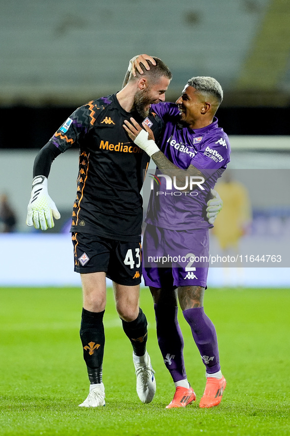 Dodo of ACF Fiorentina celebrates with David De Gea after Albert Gudmundsson scored second goal during the Serie A Enilive match between ACF...