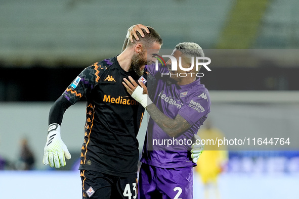 Dodo of ACF Fiorentina celebrates with David De Gea after Albert Gudmundsson scored second goal during the Serie A Enilive match between ACF...