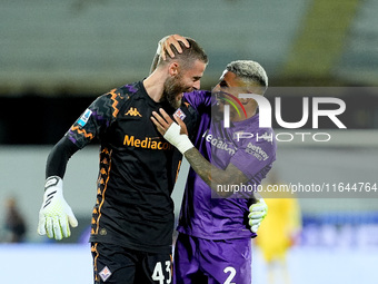 Dodo of ACF Fiorentina celebrates with David De Gea after Albert Gudmundsson scored second goal during the Serie A Enilive match between ACF...