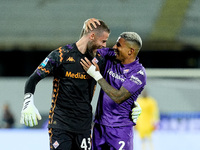 Dodo of ACF Fiorentina celebrates with David De Gea after Albert Gudmundsson scored second goal during the Serie A Enilive match between ACF...