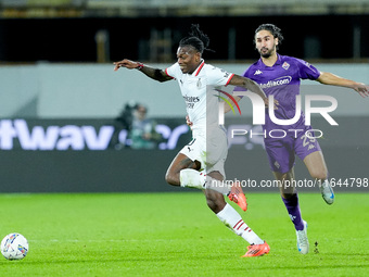 Yacine Adly of ACF Fiorentina and Rafael Leao of AC Milan compete for the ball during the Serie A Enilive match between ACF Fiorentina and A...