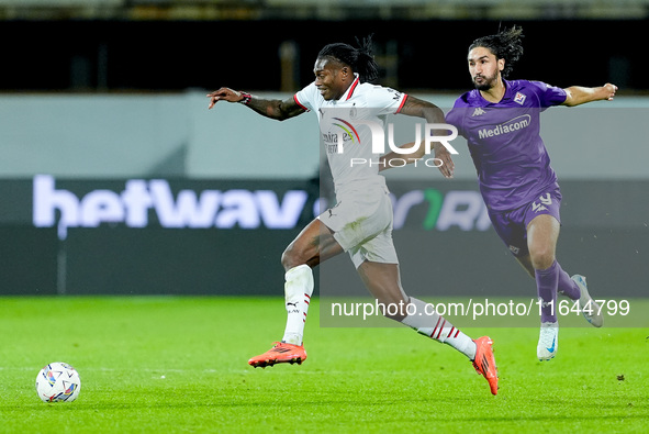 Yacine Adly of ACF Fiorentina and Rafael Leao of AC Milan compete for the ball during the Serie A Enilive match between ACF Fiorentina and A...