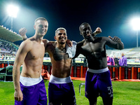 Albert Gudmundsson of ACF Fiorentina celebrates the victory with Dodo and Michael Kayode at the end of the Serie A Enilive match between ACF...