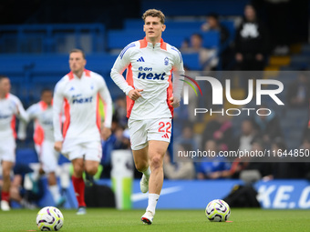 Ryan Yates of Nottingham Forest leads the players out for the pre-match warm-up during the Premier League match between Chelsea and Nottingh...