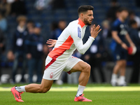 Alex Moreno of Nottingham Forest warms up ahead of kick-off during the Premier League match between Chelsea and Nottingham Forest at Stamfor...